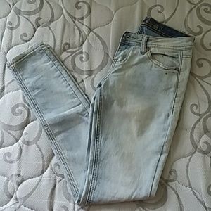 Revolution and Revolt lightwash skinny jeans